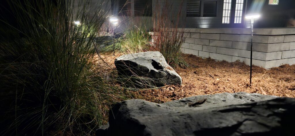 landscape lighting, decoraive stone, boulders, mulch, sitting wall, patio,