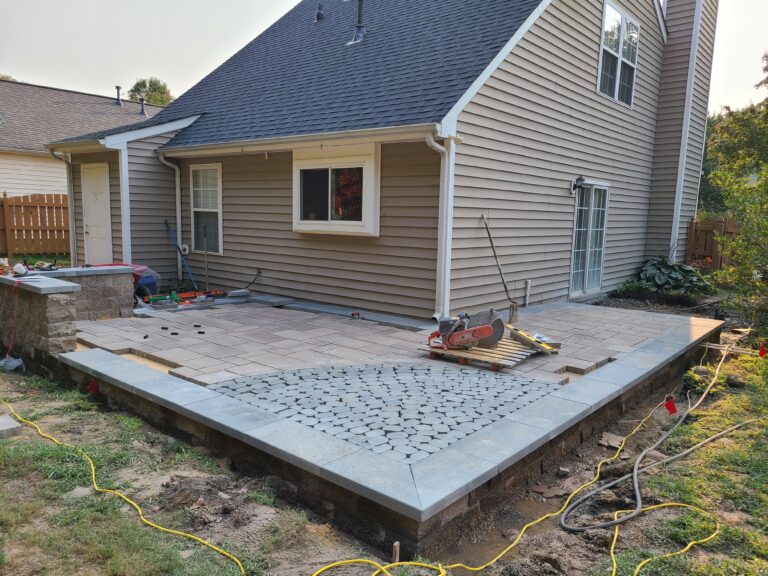 raised paver patio, paver patio, techo bloc, belgard, techobloc, sitting wall, retaining wall, patio patio border,