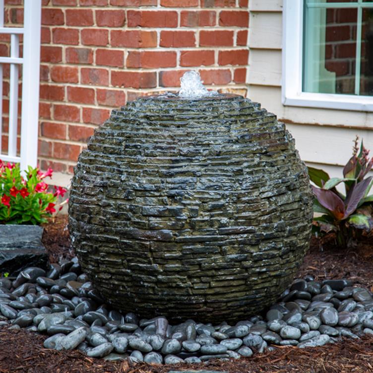 water feature, water urn, water rock, black pebble, mulch